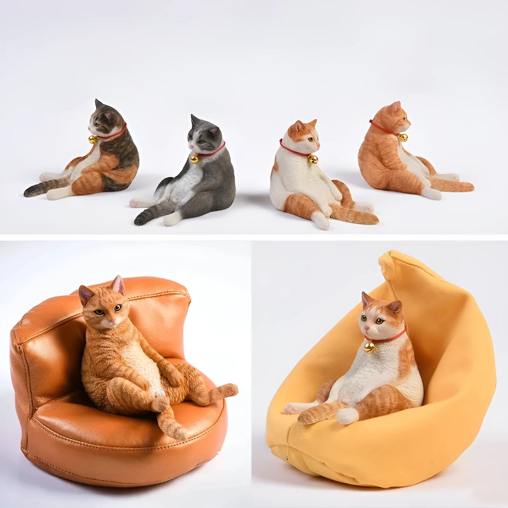 Lazy cat model ornament with sofa on car dashboard, 7.5cm high resin decoration.