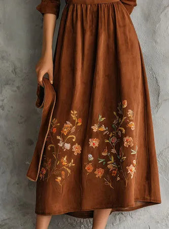 Brown polyester midi dress with vintage floral embroidery and a relaxed leisure fit.