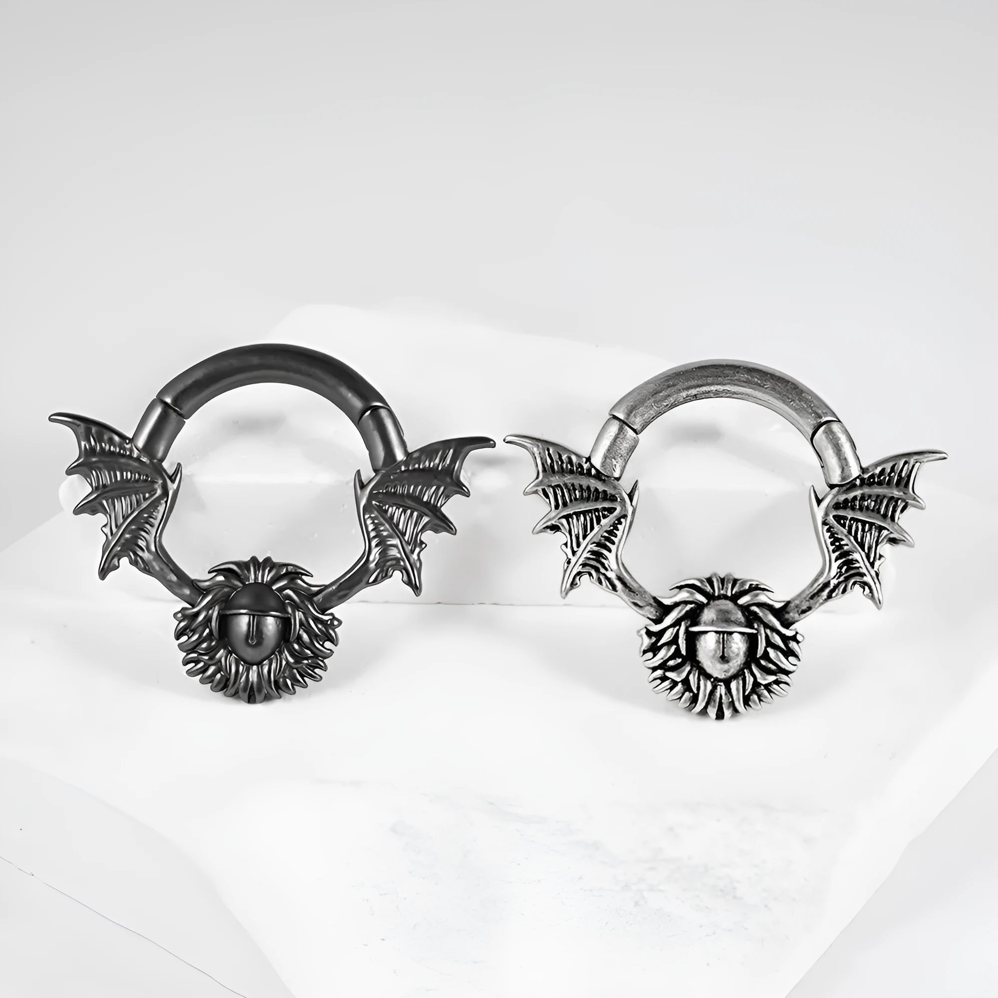 A pair of copper geometric cone-shaped earring extenders with a magnet closure, shown in one of eight available style finishes.