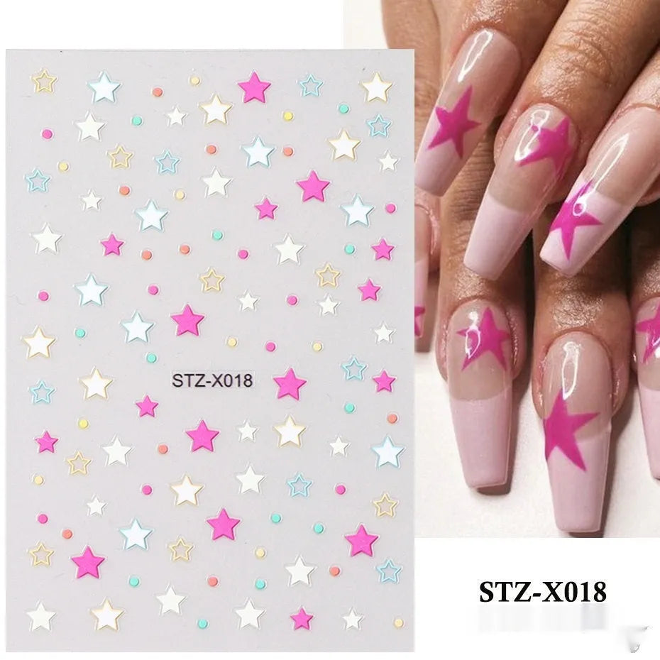 Pack of black and silver strip nail art stickers with cartoon and love pattern designs.