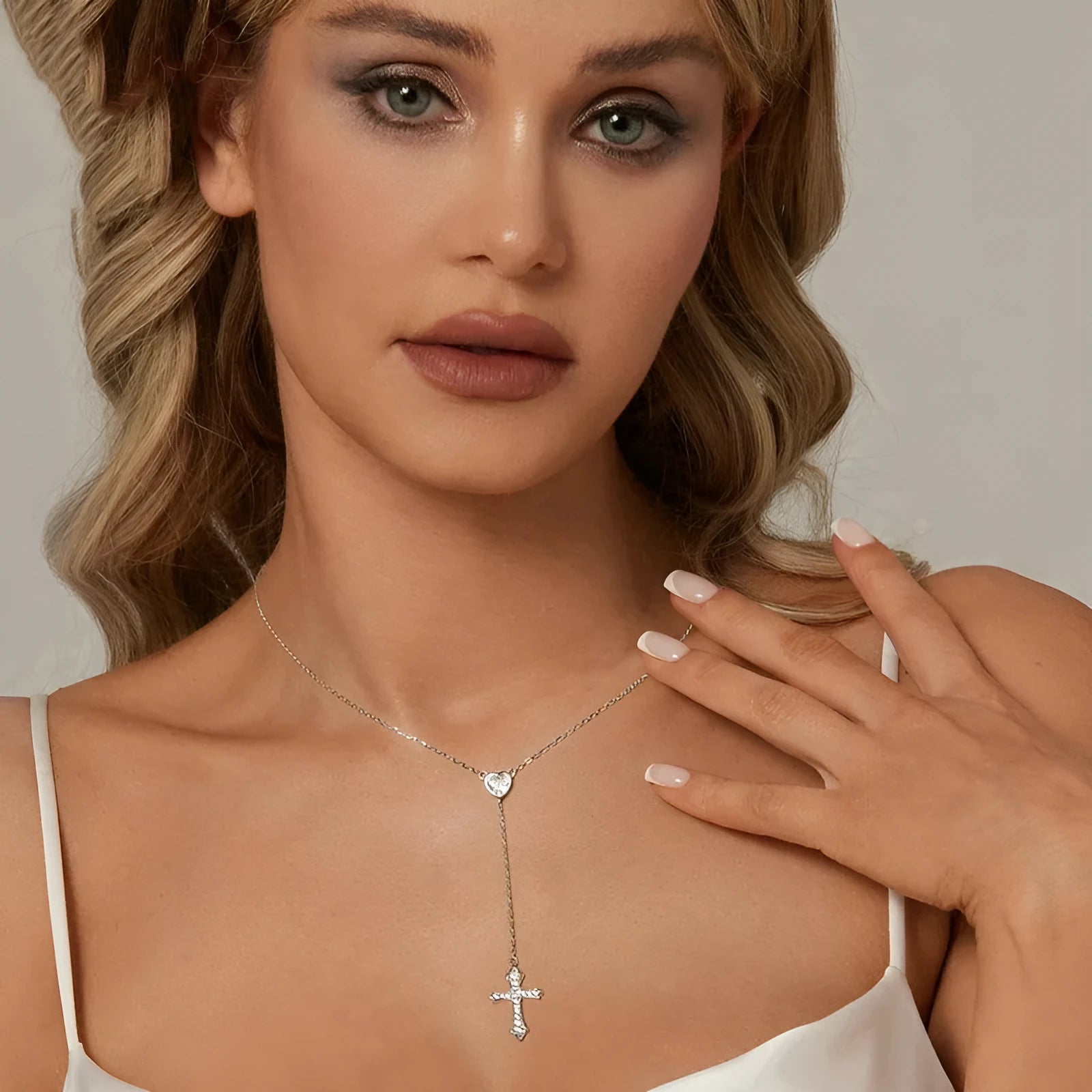 Silver love cross pendant necklace for women with 925 sterling silver pendant and O-ring chain.