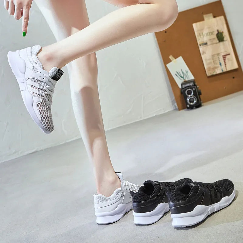 Breathable hollow out mesh sneakers in black and white colour options showing mesh upper construction