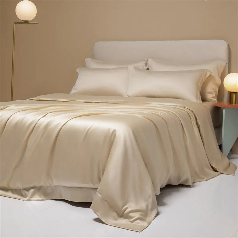 Luxury Tencel Lyocell bedding set with quilt cover, sheet, and pillowcases in grey.