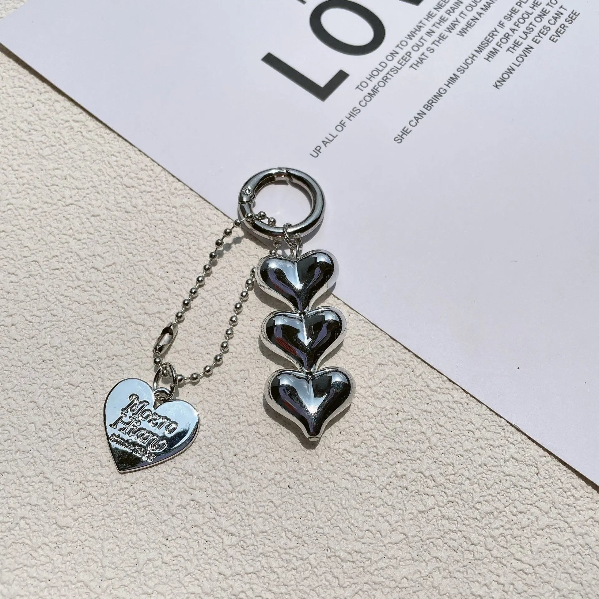 Fart Peach Love electroplated acrylic key ring with heart pattern in black, gold or white