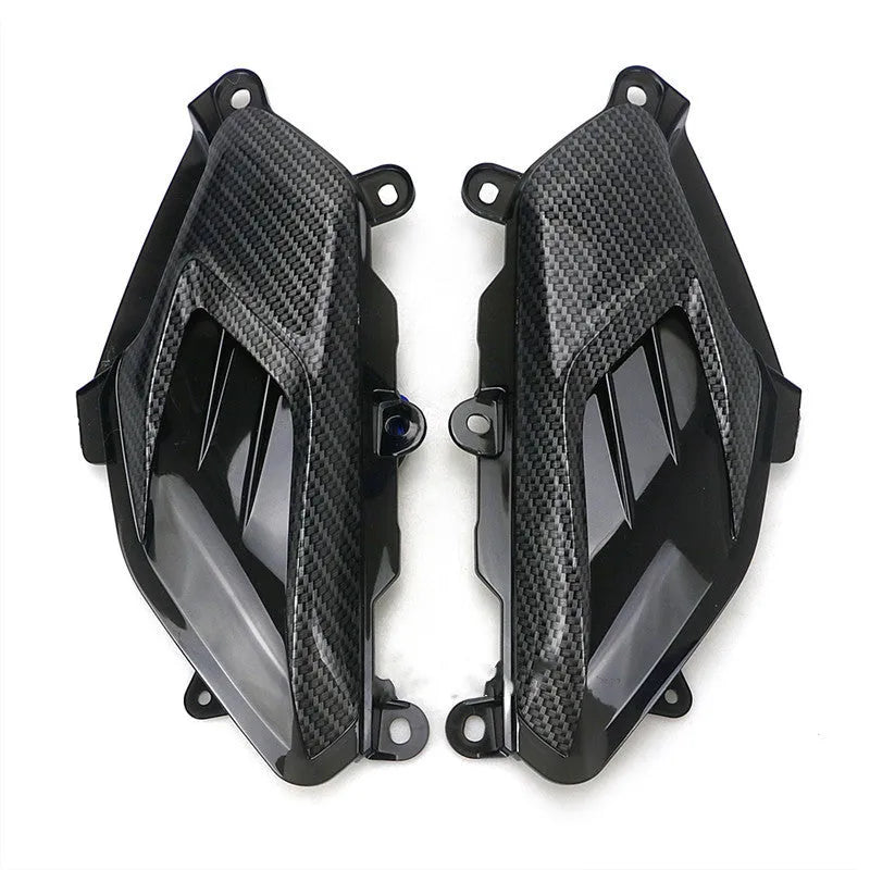 Pair of YAMAHA NMAX carbon fibre style LED side lamps, showing blue light option
