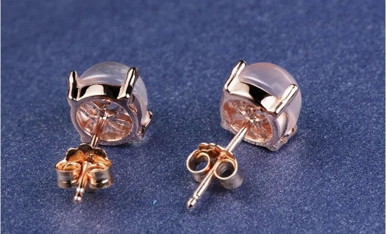 Rose gold drop-shaped stud earrings with synthetic quartz crystal inlay in Korean minimalist style