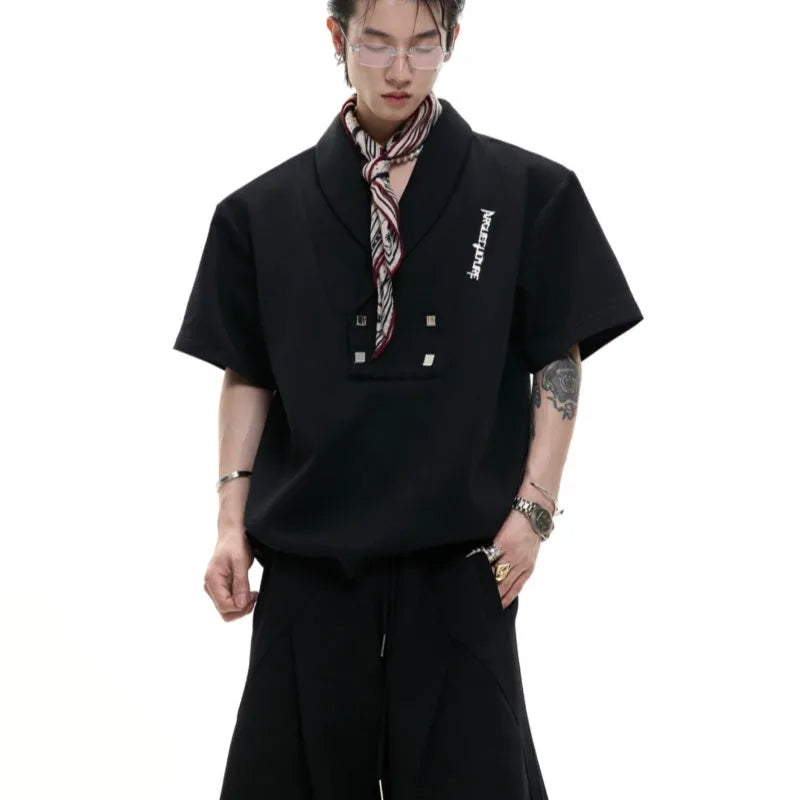 Men's dark cotton sports suit with padded shoulder V-neck top and matching shorts with metal embellishments
