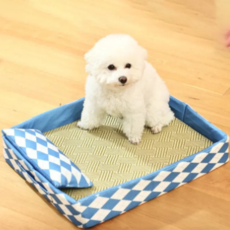 Blue woven rattan cat bed mat sitting on top of a white litter tray.