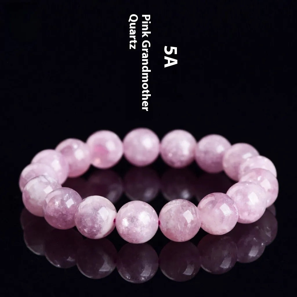 Purple geometric crystal bracelet with polished beads, shown in different size options.