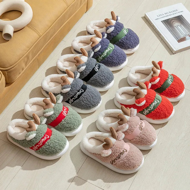 Christmas winter home slippers with suede upper and EVA sole in antler pink colour