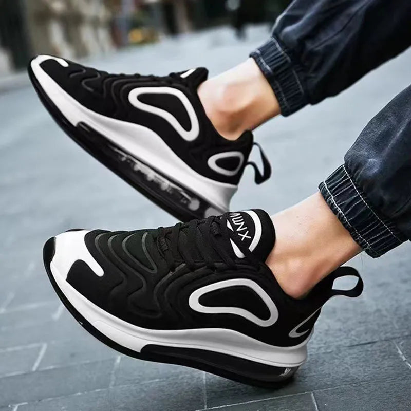 Men's black casual air cushion sneakers with a thick sole and round toe design.
