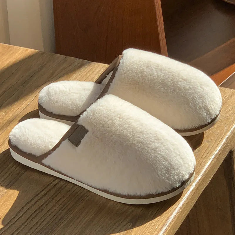 Blue PVC plush slipper with non-slip sole and car stitching detail on upper.