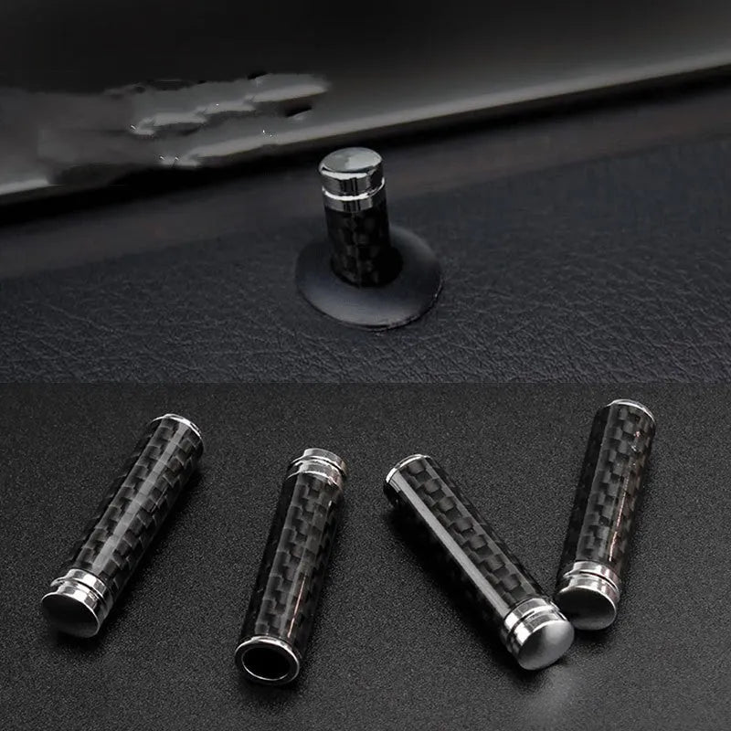 Set of four carbon fibre and metal composite car door lift covers for universal interior fitment.