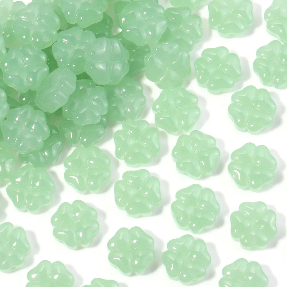 50 glass four-leaf clover beads in assorted colours with coloured glaze finish and 10mm straight hole design.