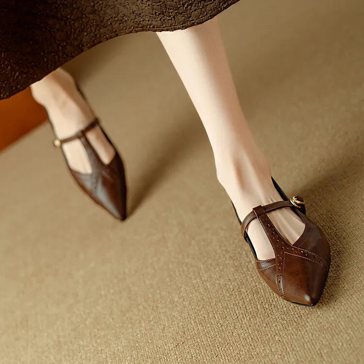 Brown women's pointed low-cut flat shoes with cowhide leather upper and a soft sole.