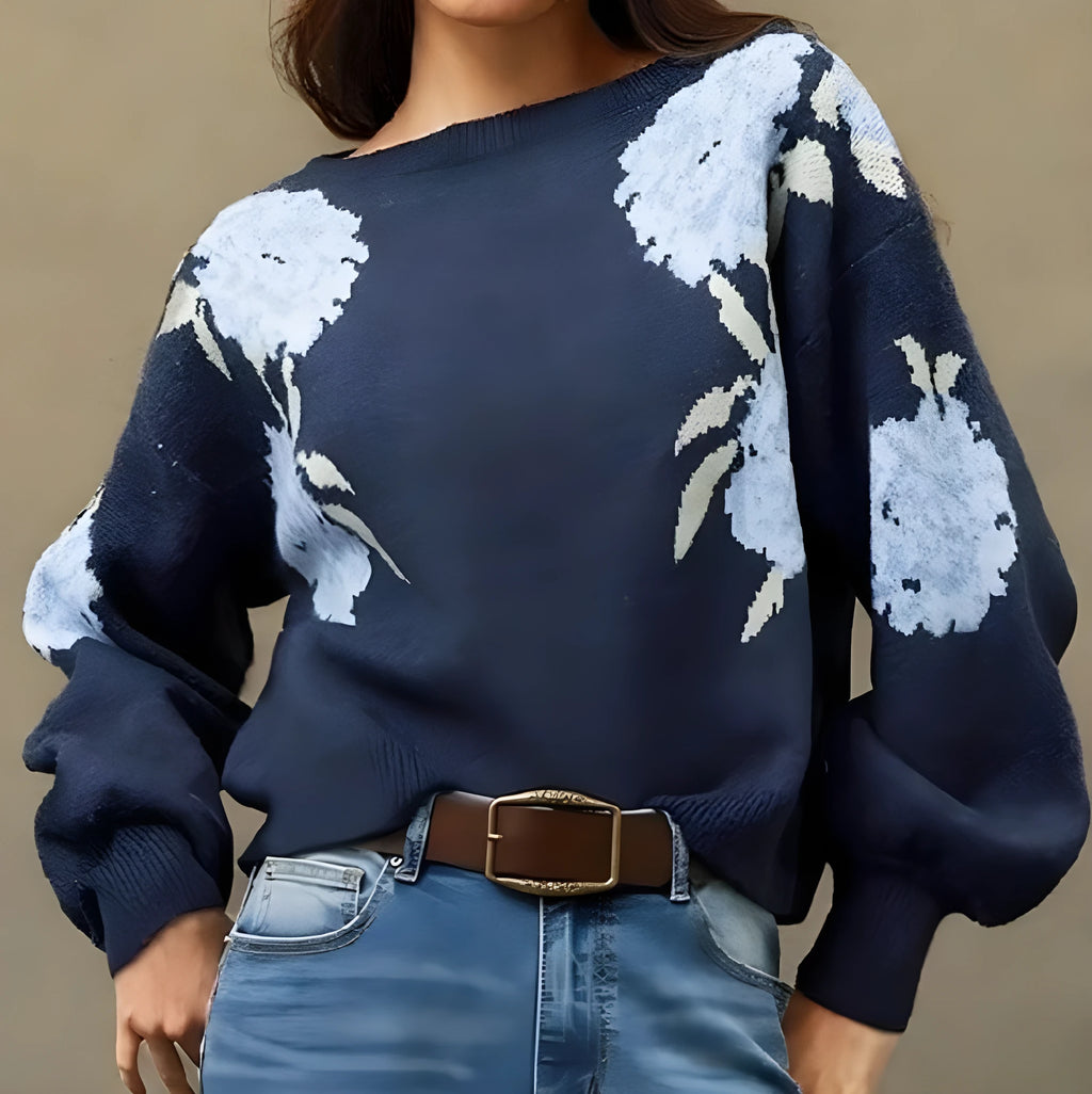 Sapphire blue women's loose pullover with woven floral jacquard pattern on chenille fabric.