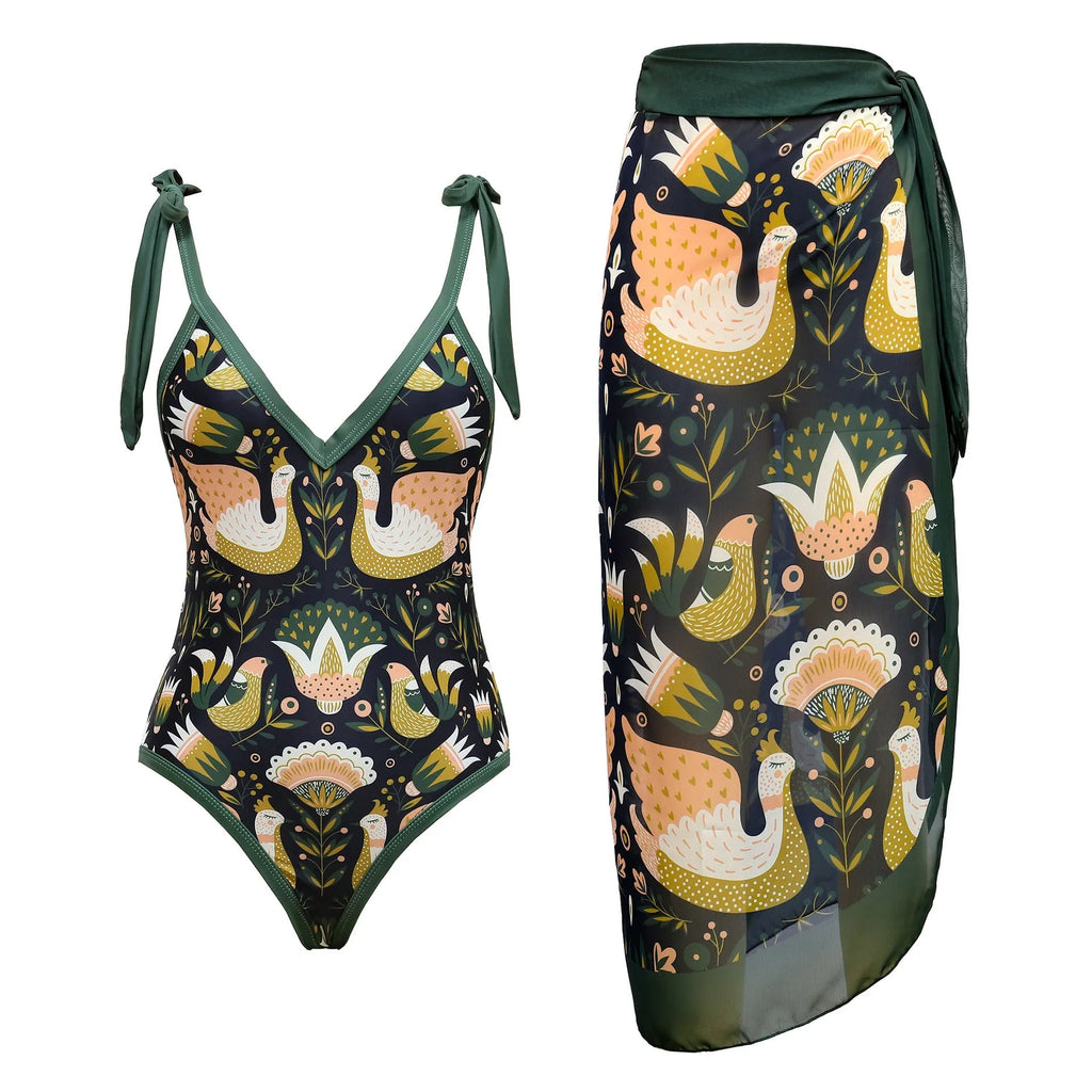 Solid colour women's one-piece swimsuit with thin spaghetti straps and a matching detachable skirt.
