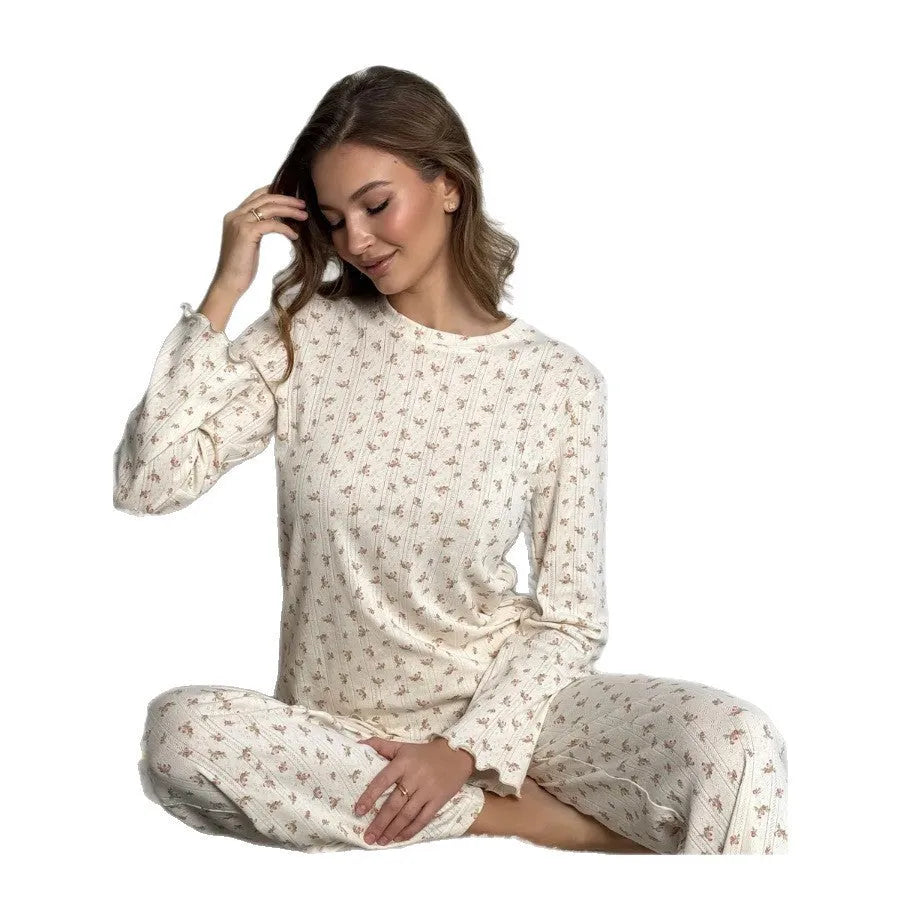 White floral print women's lounge suit with bell sleeve top and wide leg trousers