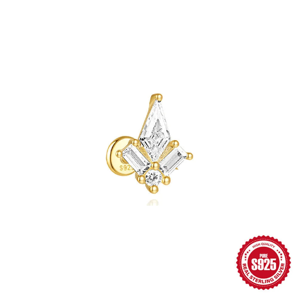 Geometric kite-shaped sterling silver stud earrings with rhinestones and a gold chain tassel.