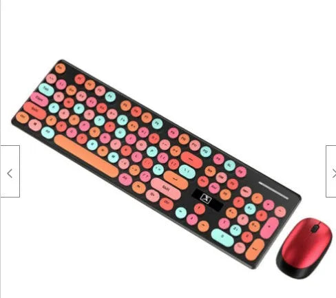 Vibrant yellow wireless punk manipulator design keyboard and mouse set on a desk.
