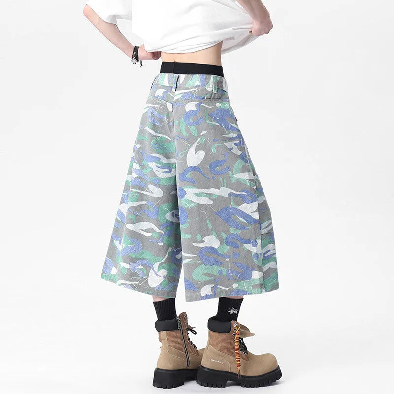 Cropped camouflage colour denim work trousers with straight leg and zipper fly on a mannequin