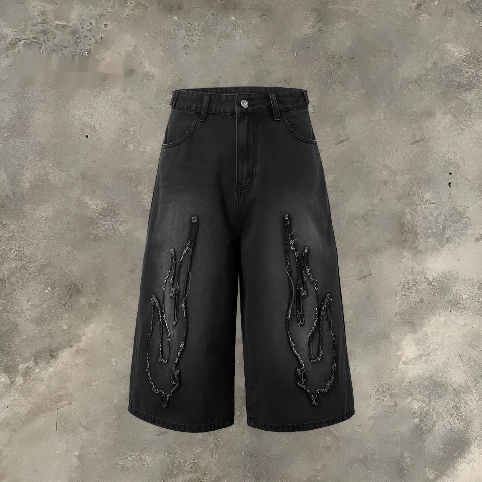 Men's black denim cropped shorts with flame embroidery patch design on leg