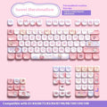 Sweet cotton candy coloured mechanical keyboard keycaps arranged in complete 112-key and 120-key sets