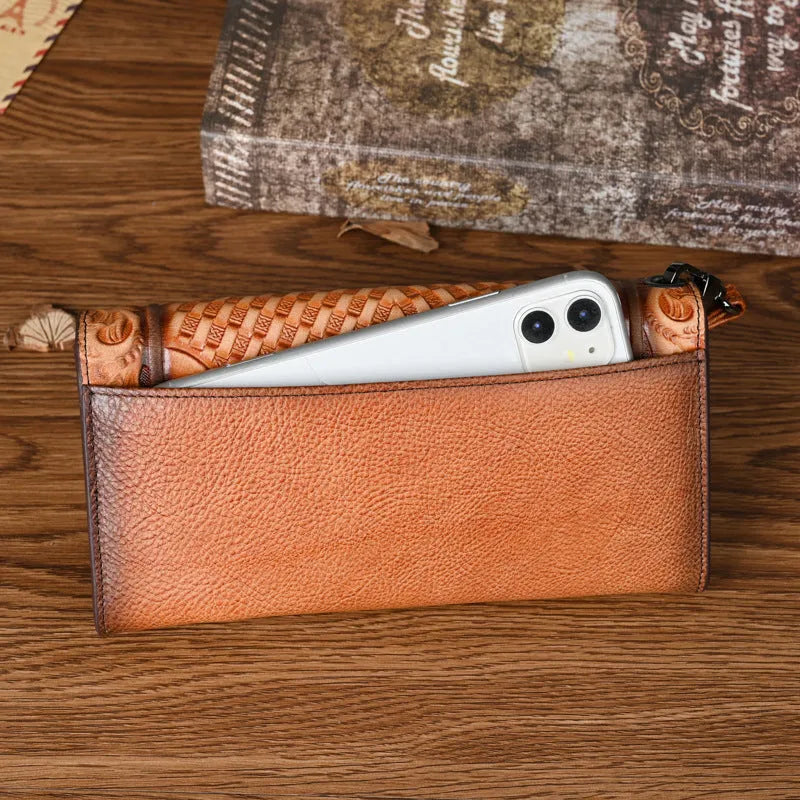 Chinese style brown leather tri-fold wallet with a floral embossed pattern, shown open to reveal compartments.