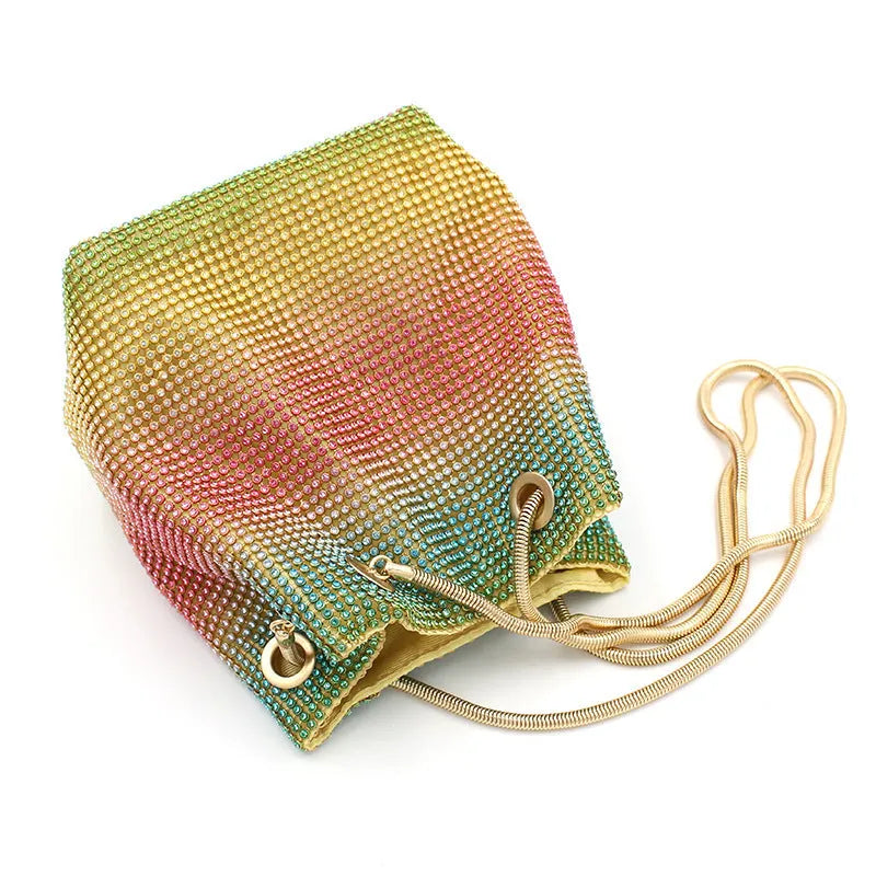 Colourful rhinestone bucket bag with glittery crystal embellishment and soft fabric construction