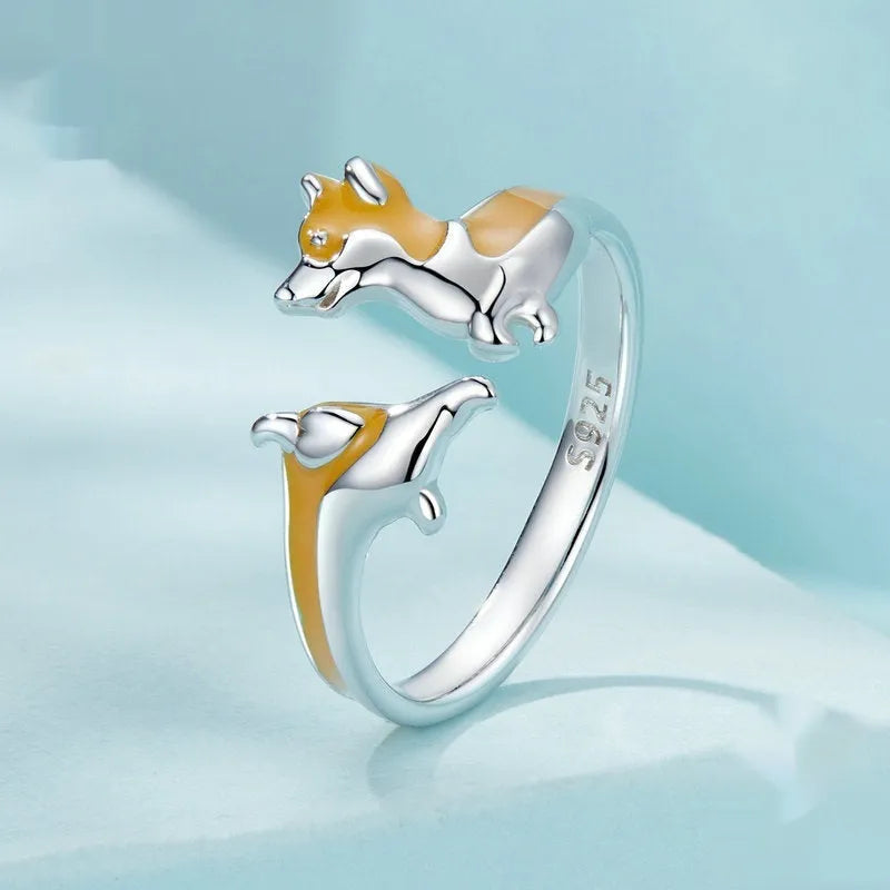 Silver electroplated fashion ring with a cartoon Corgi dog design, colour SCR1014-E.