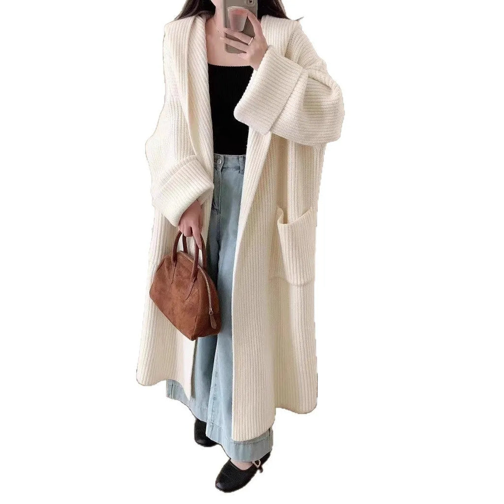 Loose hooded acrylic cardigan coat for women in beige colour with 80cm length and raglan sleeves