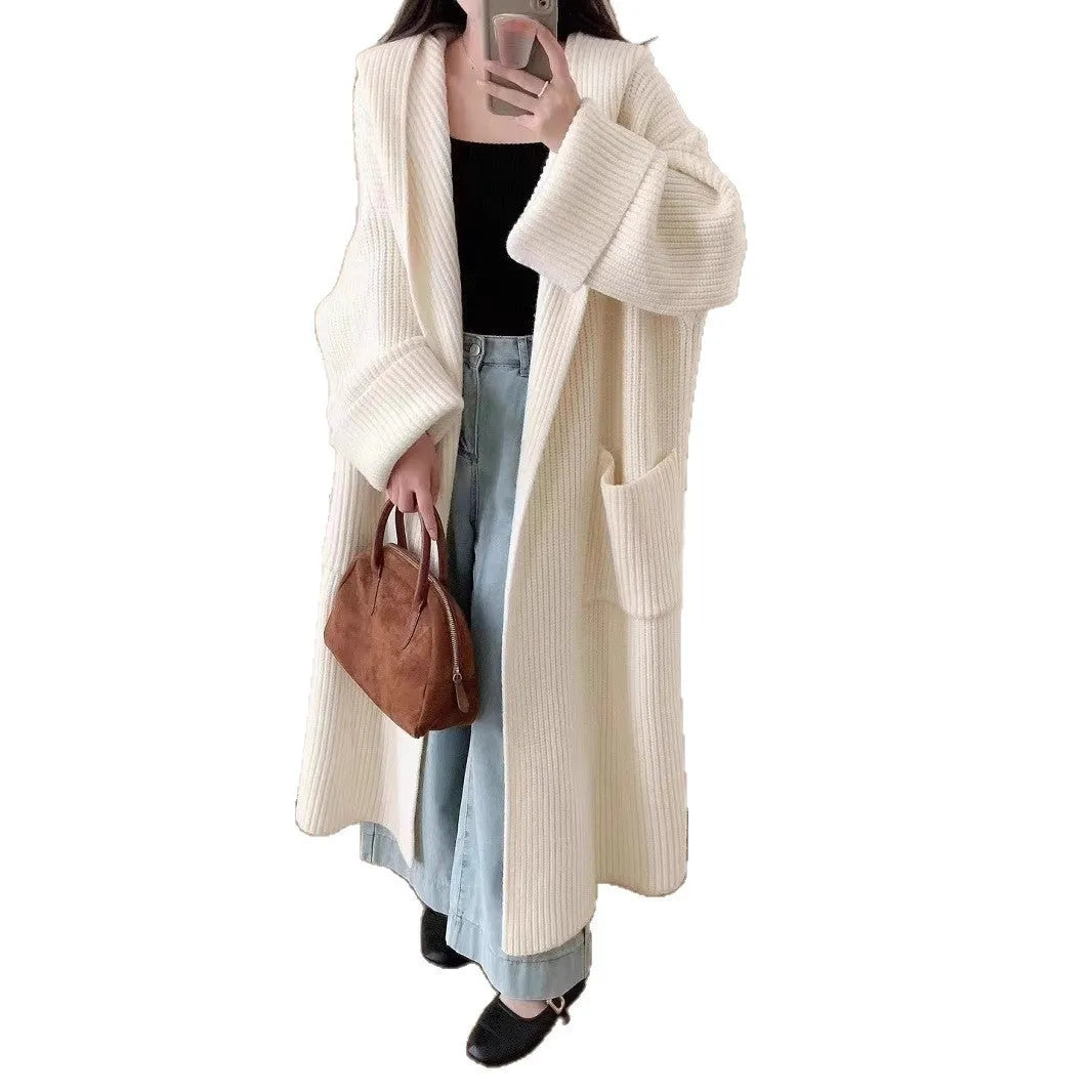 Loose hooded acrylic cardigan coat for women in beige colour with 80cm length and raglan sleeves
