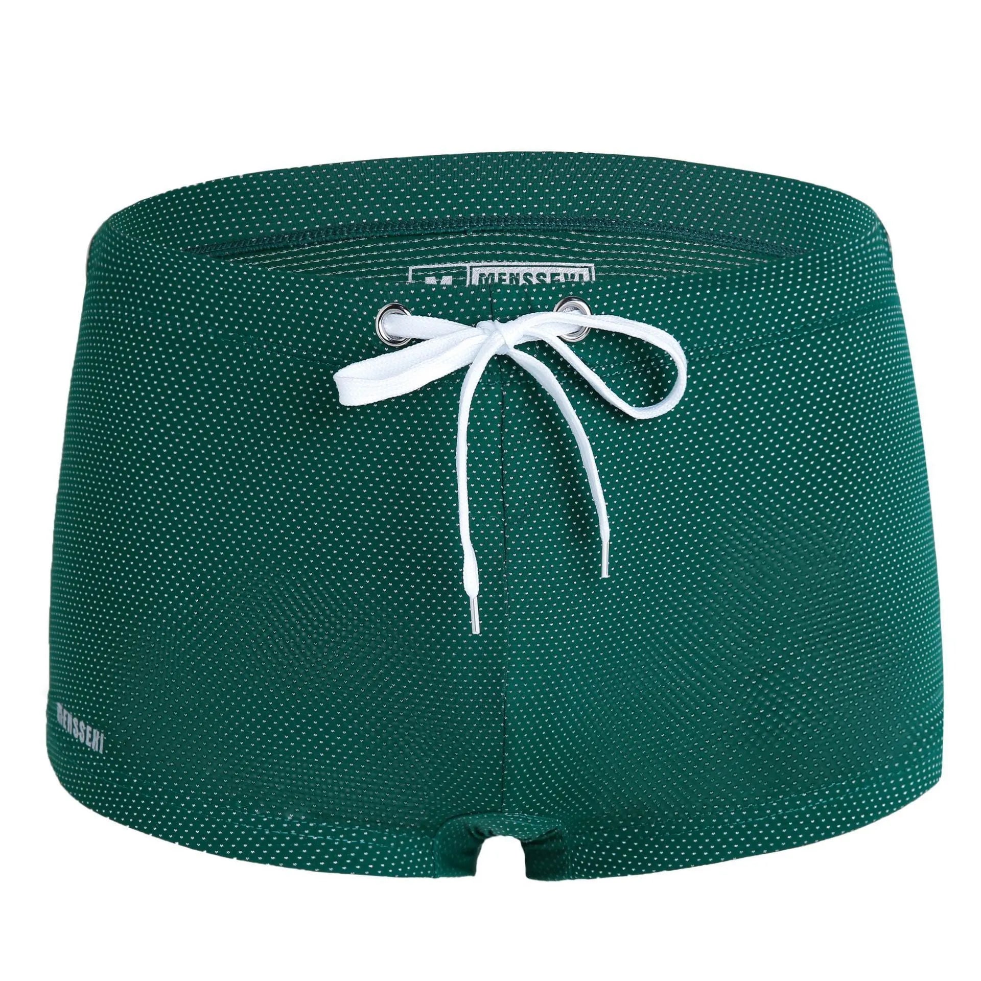 Men's low waist nylon swimming trunks in a solid colour on a white background.