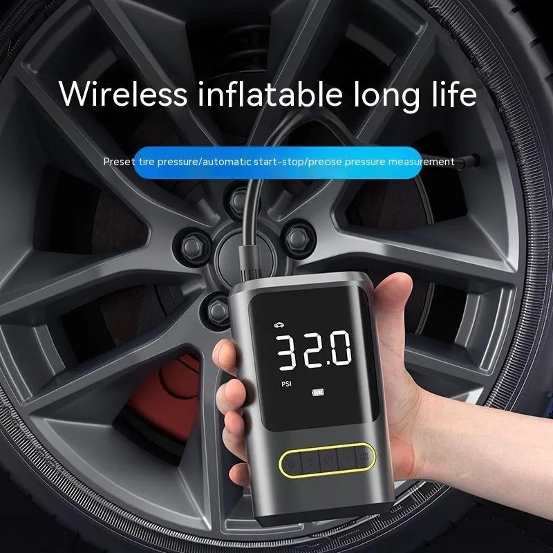 Handheld wireless digital display air pump with LED light shown inflating a car tyre