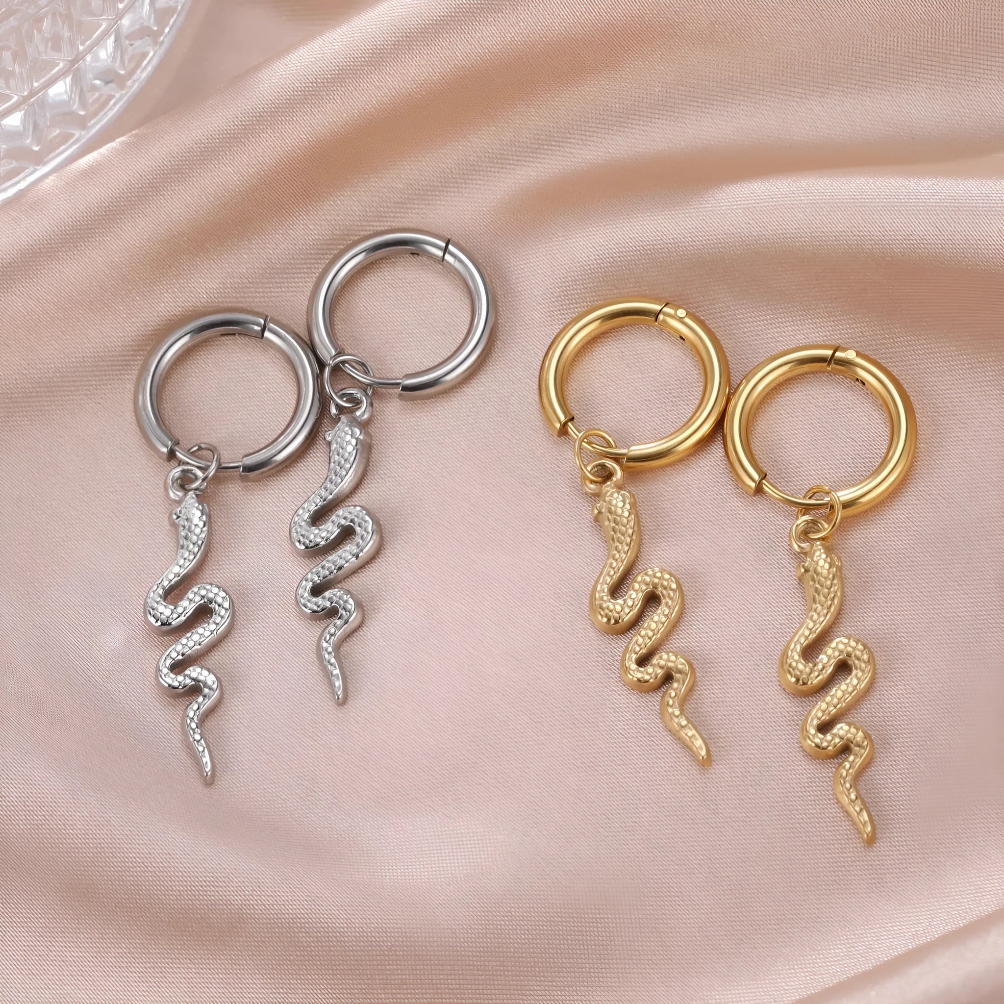 Stainless steel vintage snake-shaped clip-on earrings with gold plating.