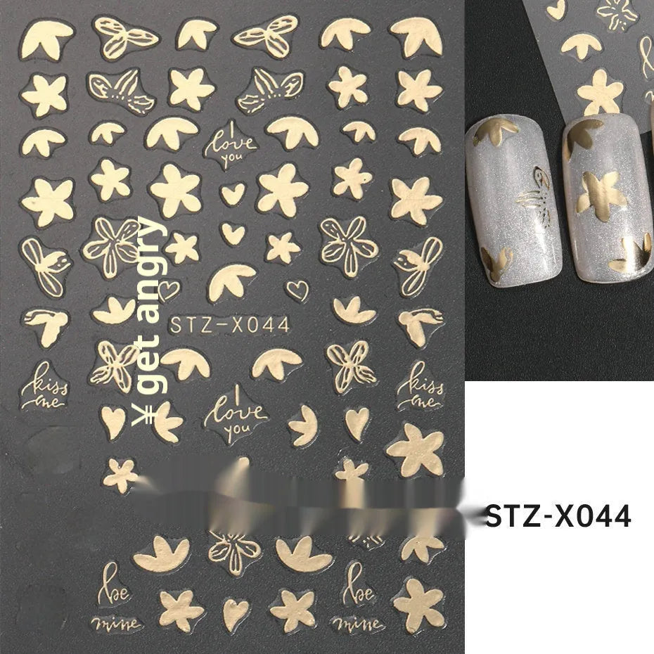 Pack of black and silver strip nail art stickers with cartoon and love pattern designs.