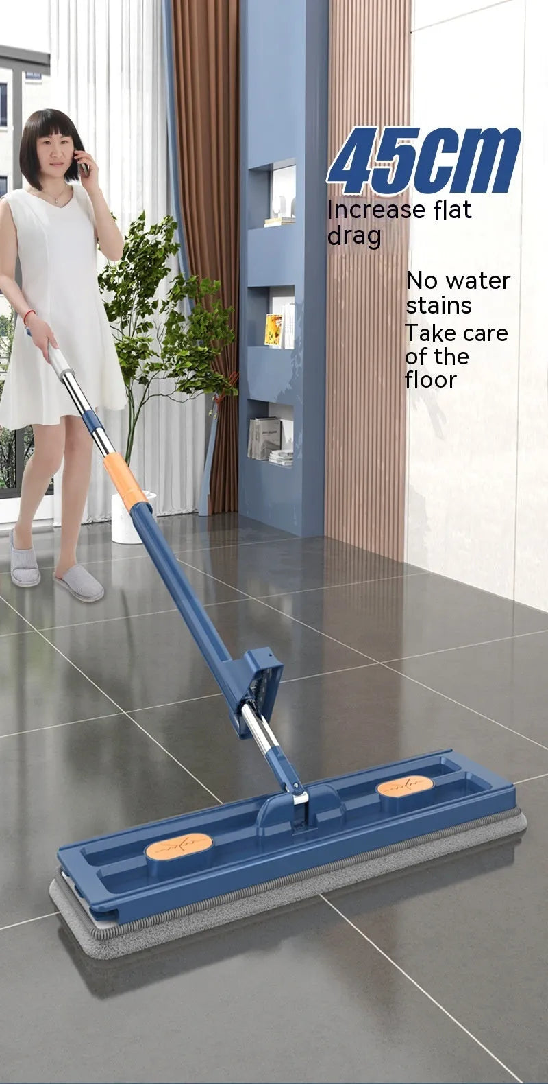 Large flat mop with long stainless steel handle and blue/white cloths on a hard floor.