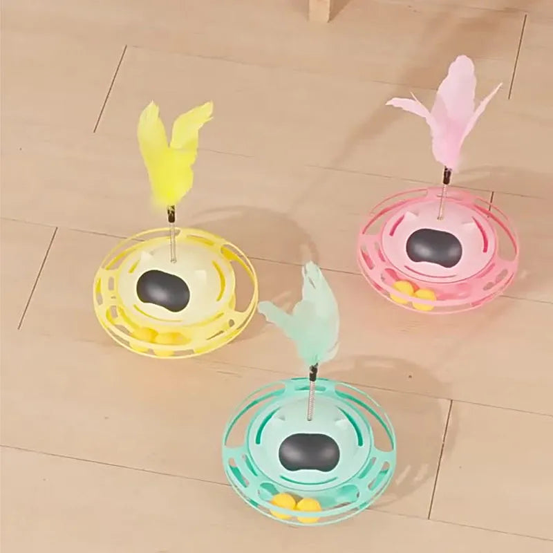 Pink cat tumbler turntable toy with automatic motion mechanism for indoor feline play