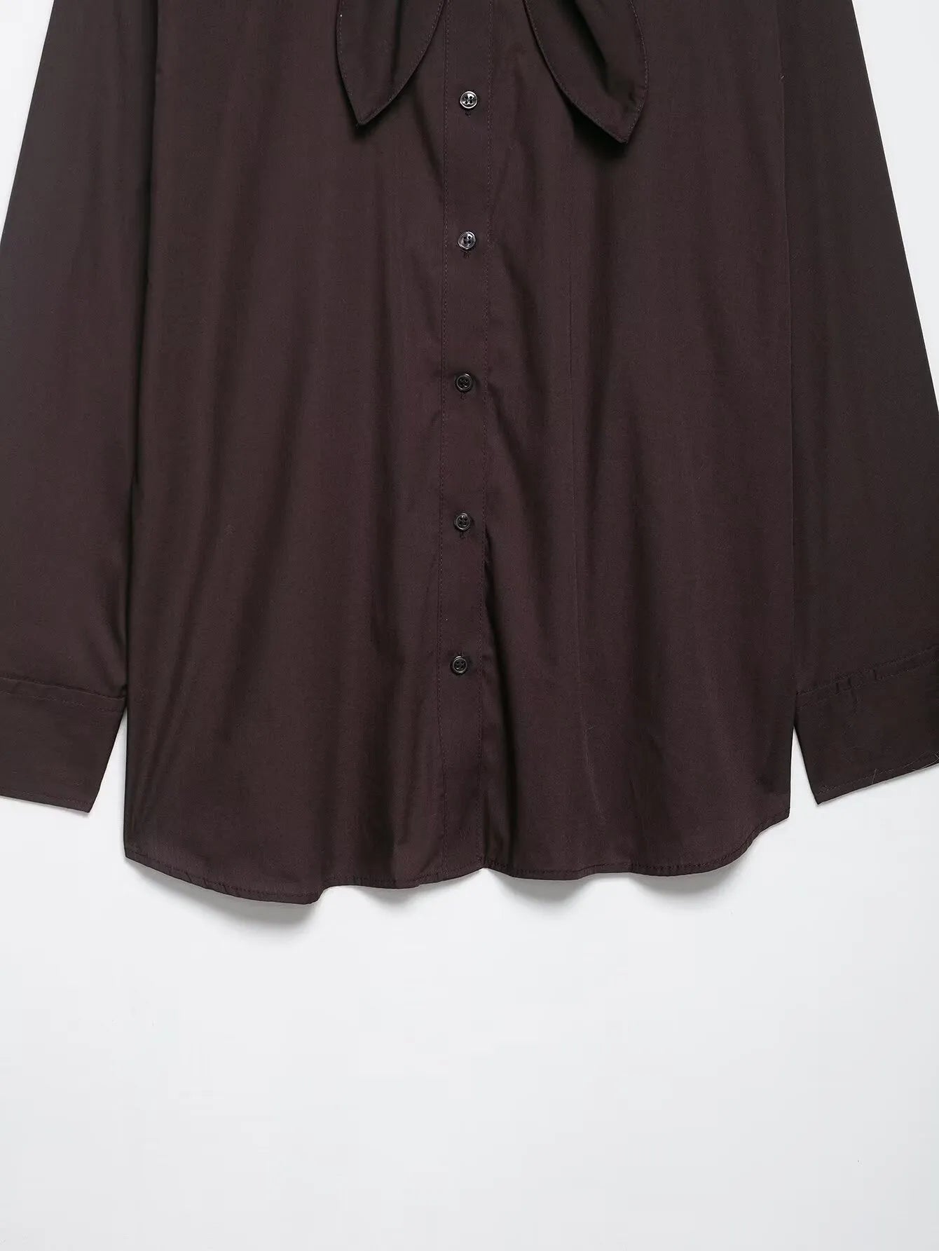 Brown loose-fit women's polyester poplin shirt with an attached bow tie, cardigan style.