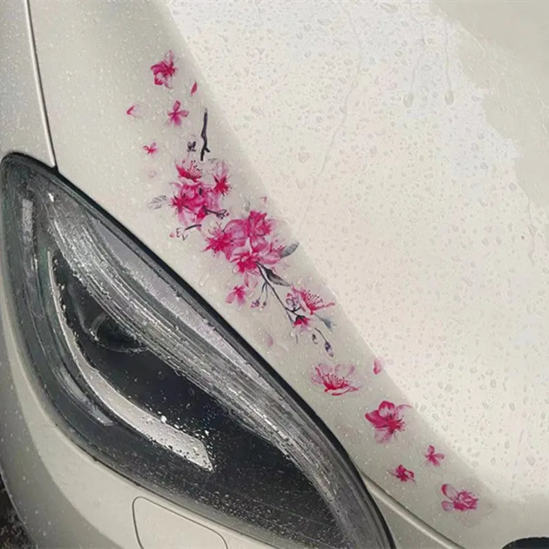 Cherry blossom flower pattern car sticker in two size options on a vehicle window.