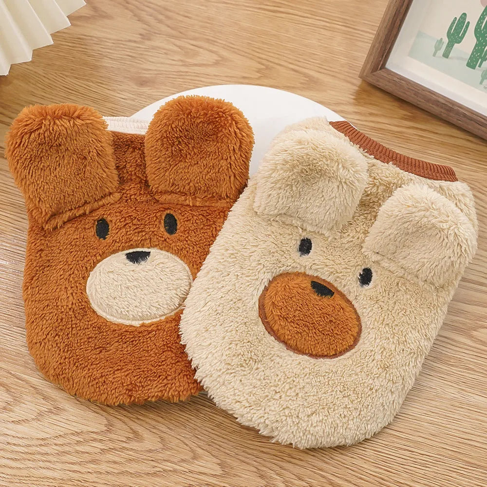 Fleece-lined cream polyester dog coat with bear ears on a small pet, available in sizes XXS to XL for 1-12kg dogs