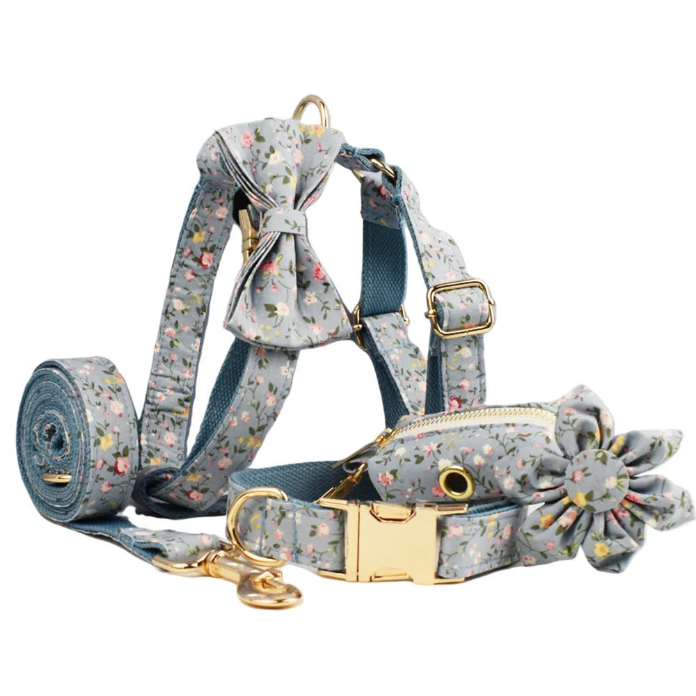 Blue floral polyester cotton dog collar set with matching leash, vest, bow and accessories