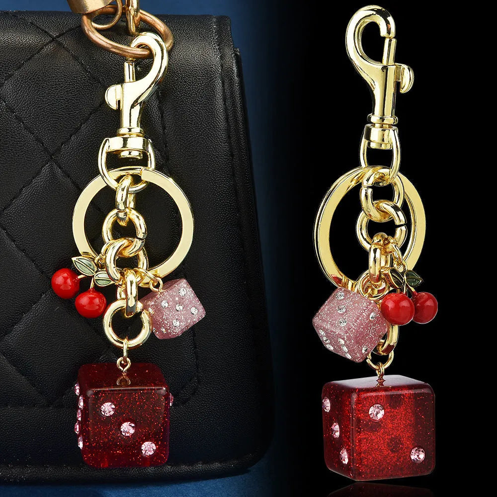Square metal dice bag keychain pendant with cherry two-tone electroplated finish