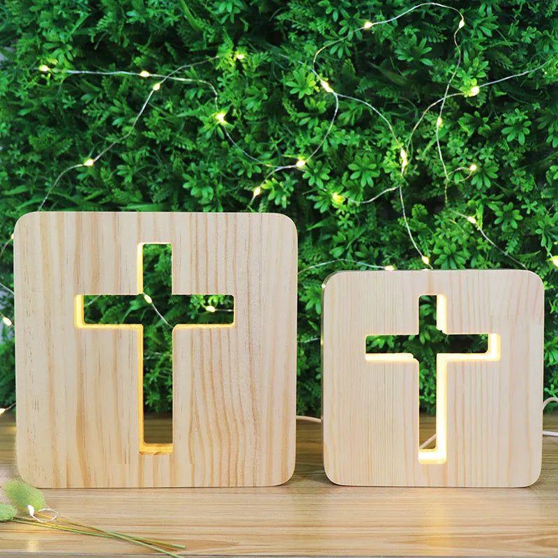 Solid wood hollow night lamp with warm white LED light on a surface.
