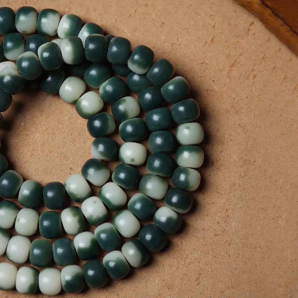 Lotus White Jade Bodhi root bracelet with floating flowers pattern on 8 × 10mm beads