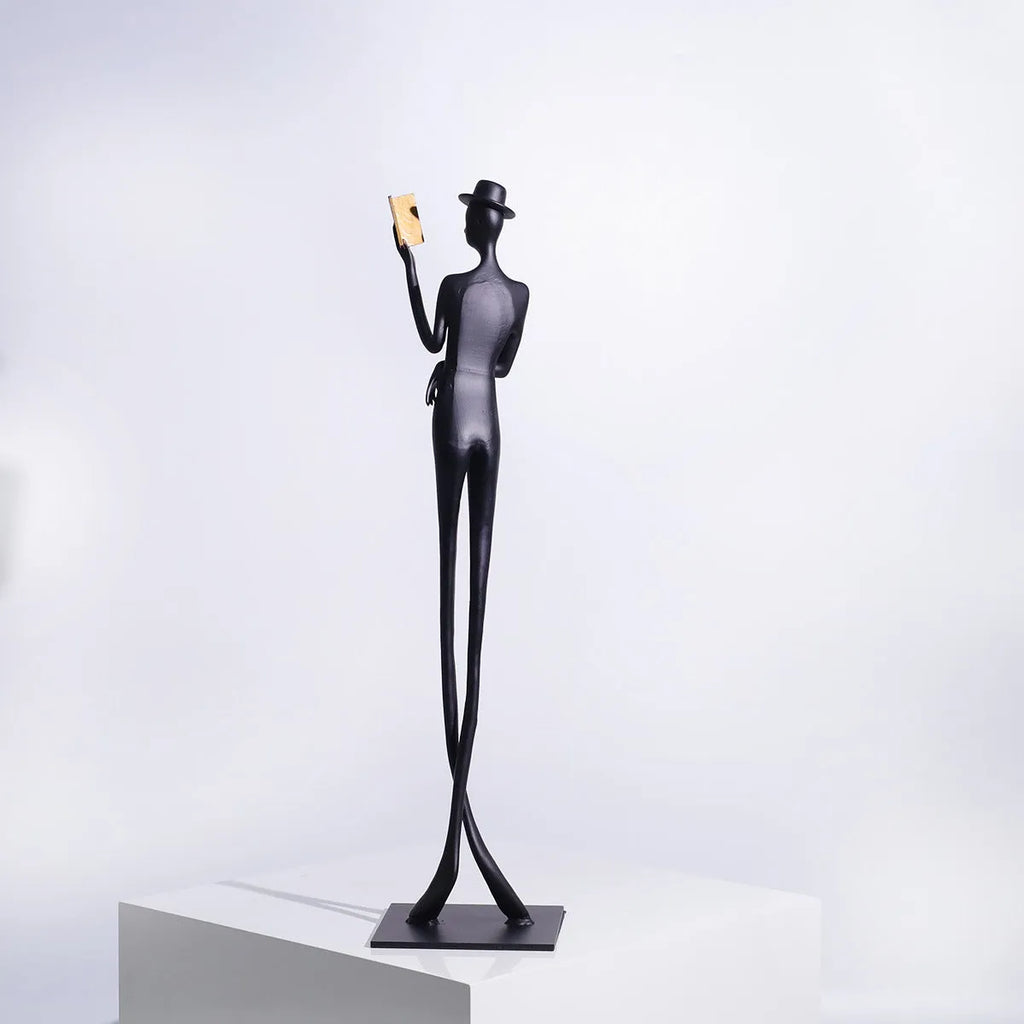 Black cast aluminium reading woman desktop sculpture modern design 51cm tall