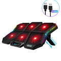 Black and red six-fan notebook radiator cooler with USB cable on a desk.