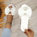 Women's leopard print beach slippers with thick soles and round toe in black colour