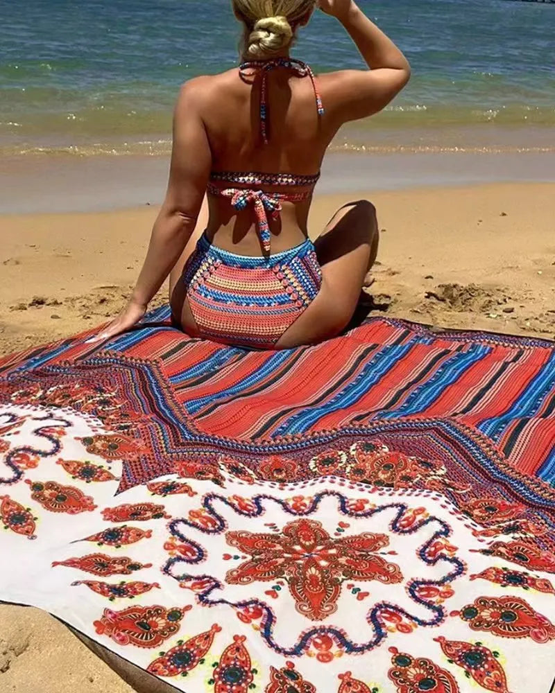 Women's three-piece swimsuit set with a cutout sleeveless top, high-waist briefs, and a matching coat.