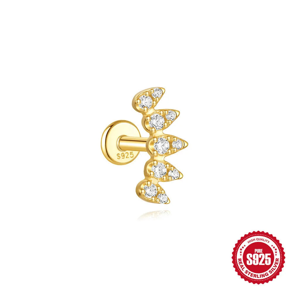 Geometric kite-shaped sterling silver stud earrings with rhinestones and a gold chain tassel.
